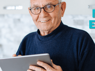 Older man with a tablet, learning during National Medicare Education Week