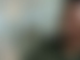 A man using a laptop to take online courses for HRCI Business Credit