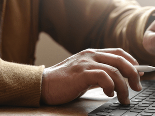 Person holding a pen and using a tablet to take accounting courses from Kelen Camehl