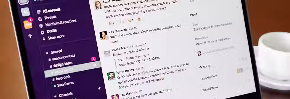 An open laptop screen displays Slack, one of several small business tools for communication
