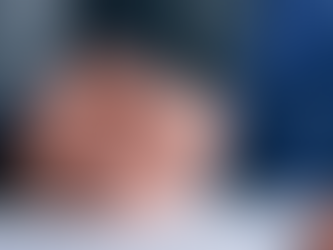 Person filling out papers for CPA recertification