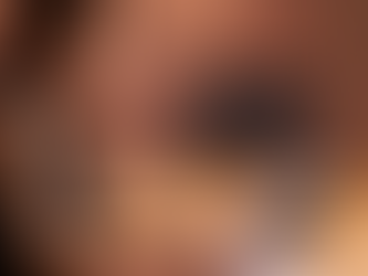 Woman who has autonomy in the workplace sitting alone at a large desk