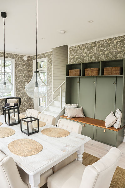 Villa Junnola interior featuring wardrobe and elegant décor