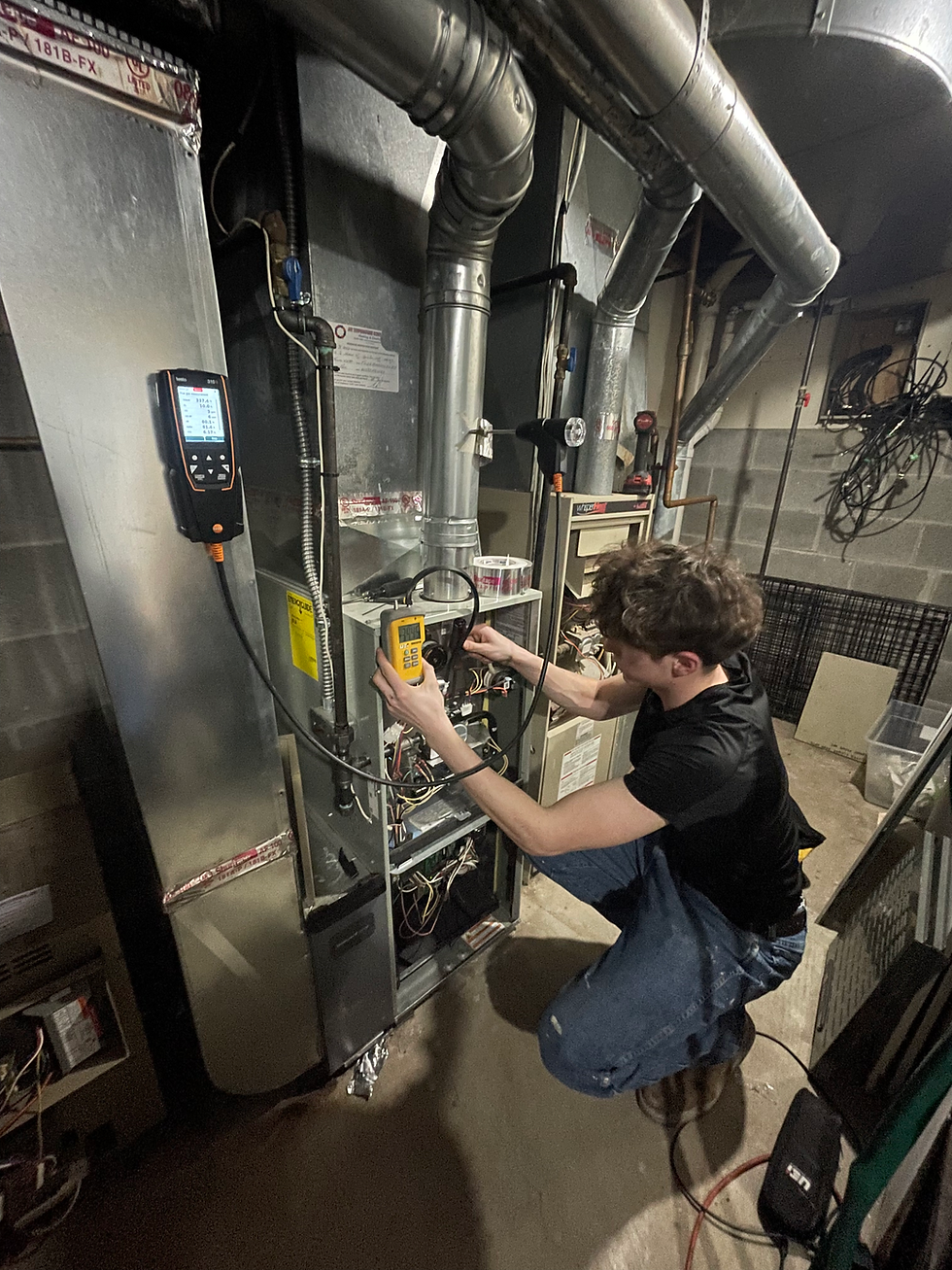 Tech performing furnace tune up