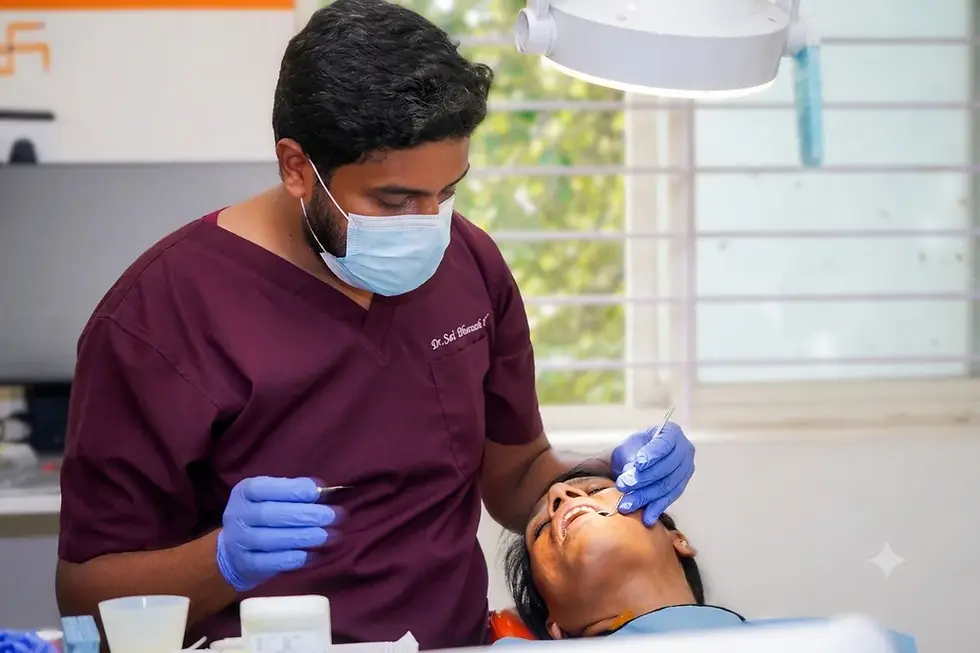 Dentist performing surgery at Chandra Dental Care Bangalore