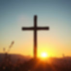 sunrise with a cross in the wilderness in spring.jpg