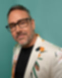 A man wearing bold & tailored Wolf eyeglasses.