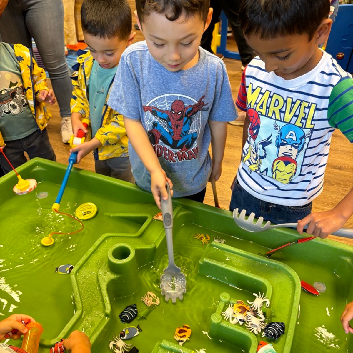 A child from a CMOCJ community pop-up