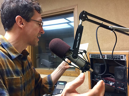 Author Mark Ristau at AM 950 Radio in Eden Prairie, Minnesota, promoting A Hero Dreams, A Novel