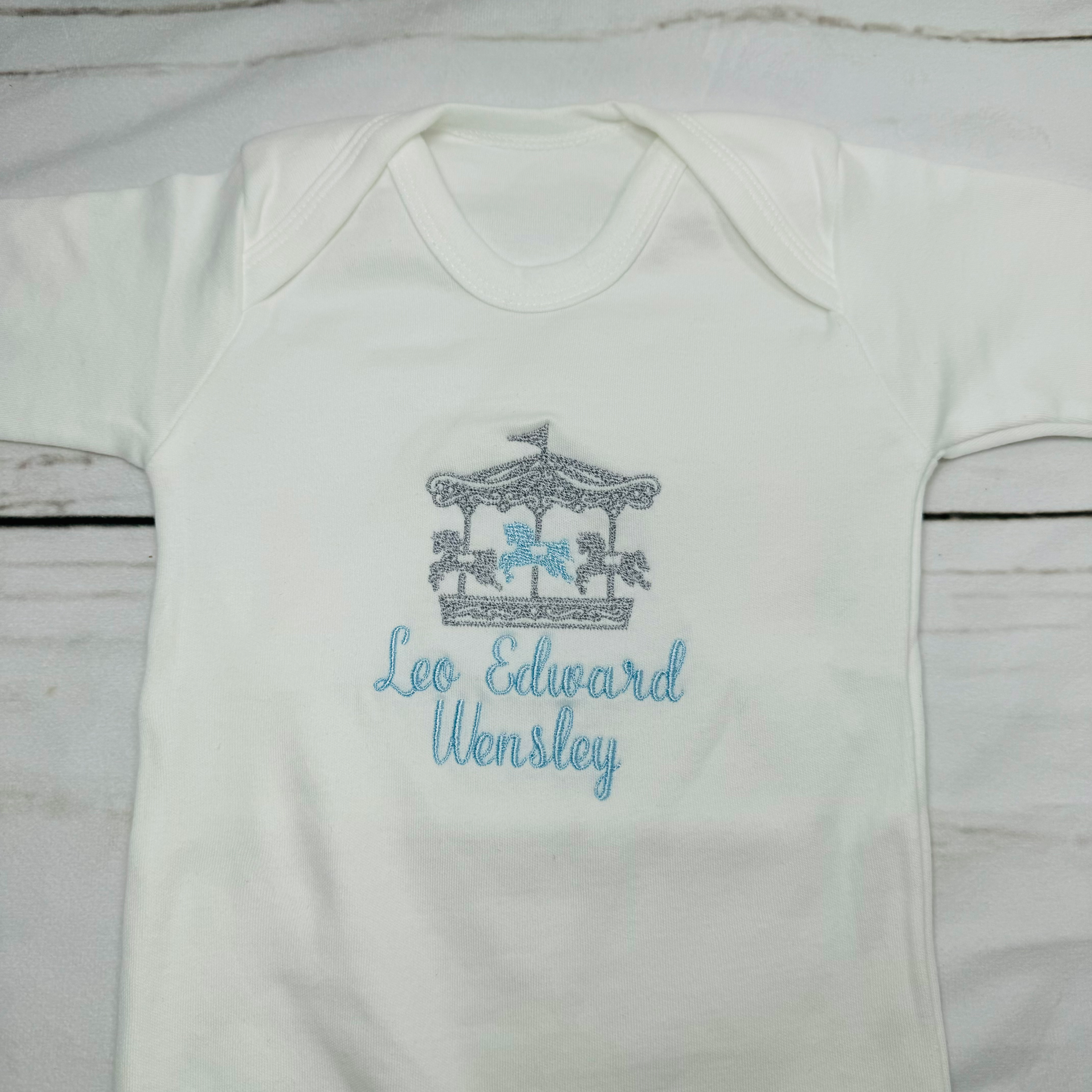 carousel full front baby grow