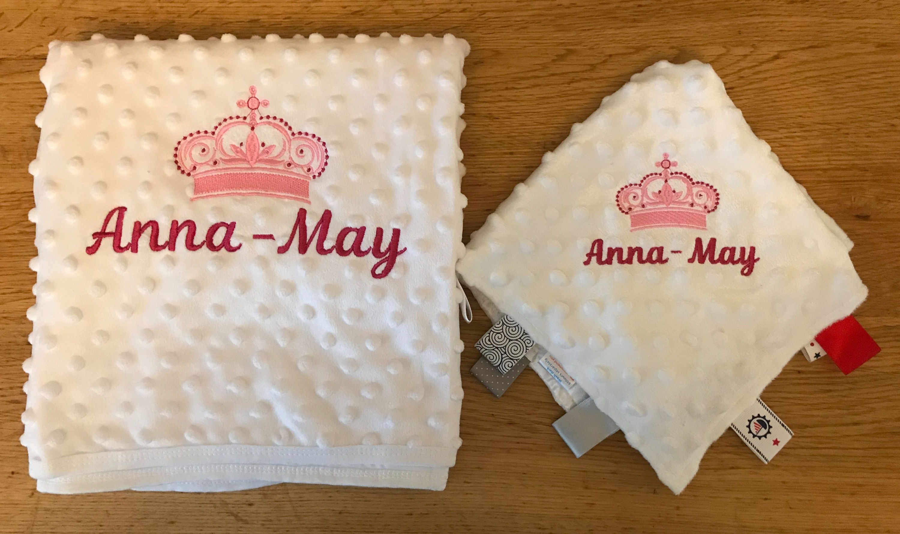 Tiara blanket and taggy.