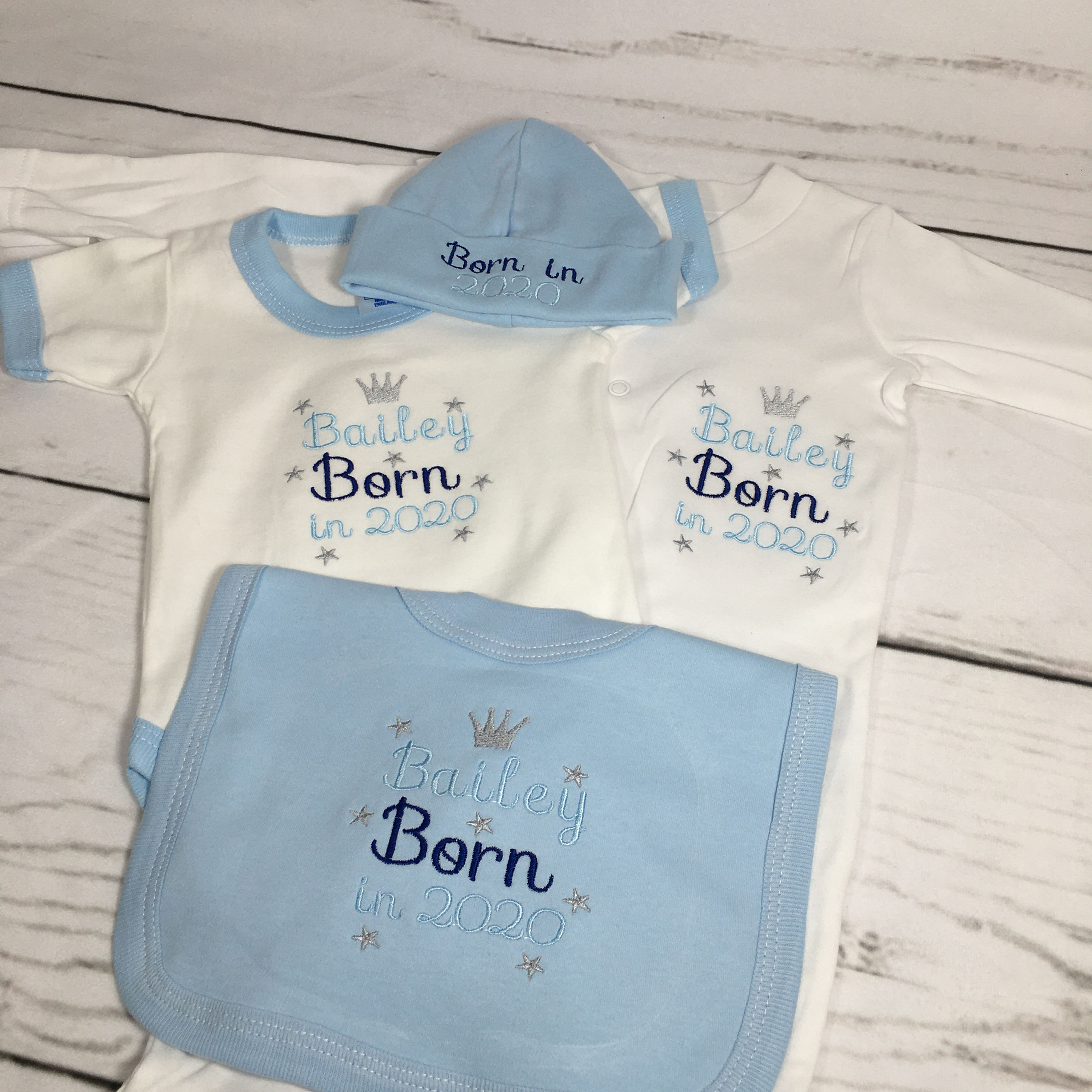 Born in 23/24 sleep suit,vest, bib and cotton hat 0-3m