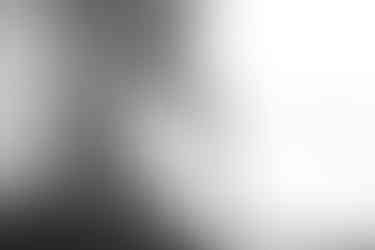 groom putting on his suspenders