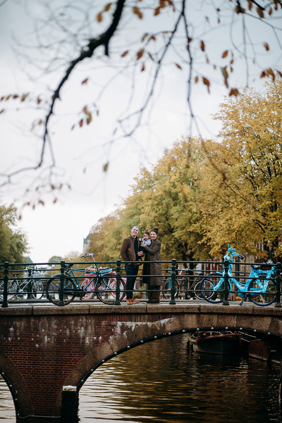 Family walking along an Amsterdam canal 