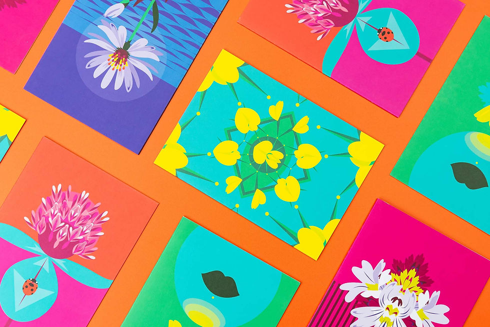 Colorful floral illustrated cards on orange background; patterns include daisies, ladybugs, and abstract designs in vibrant hues.