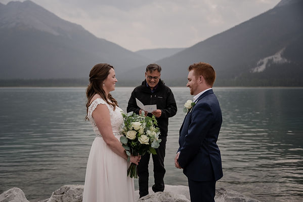 Couple by spray lakes for ceremony