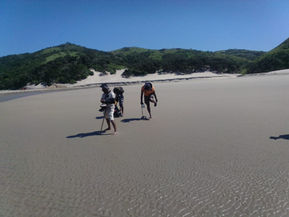Hikers on an unspoilt Beach on the Wild Coast.