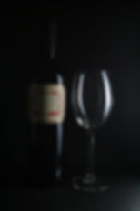 Bottle of Red Wine and a Glass