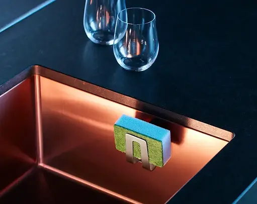 HAPPY SiNKS Sustainable Magnetic Sponge Holder featuring premium stainless steel construction, magnetic tool-free installation, Scandinavian sink organization + space-saving kitchen sponge storage.