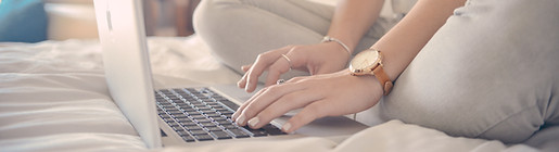 Laptop Typing on Bed