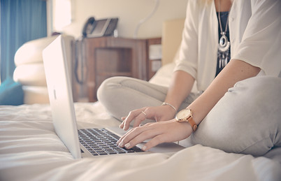 Laptop Typing on Bed