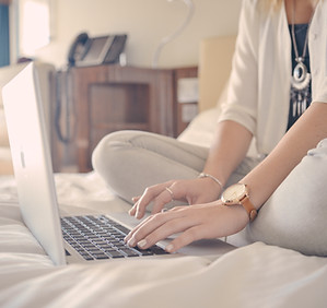 Laptop Typing on Bed