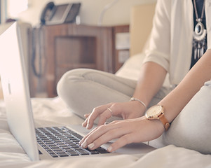 Laptop Typing on Bed