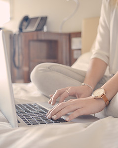 Laptop Typing on Bed