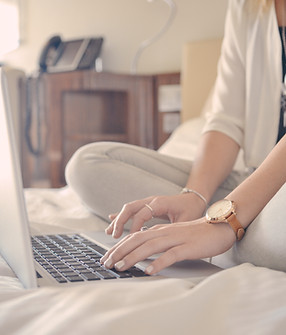 Laptop Typing on Bed