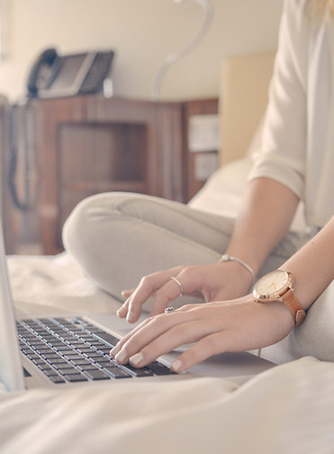 Laptop Typing on Bed