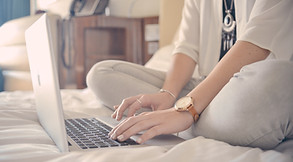 Laptop Typing on Bed