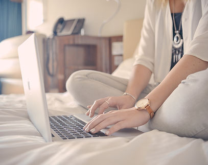 Laptop Typing on Bed
