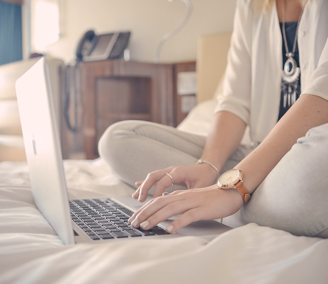 Laptop Typing on Bed