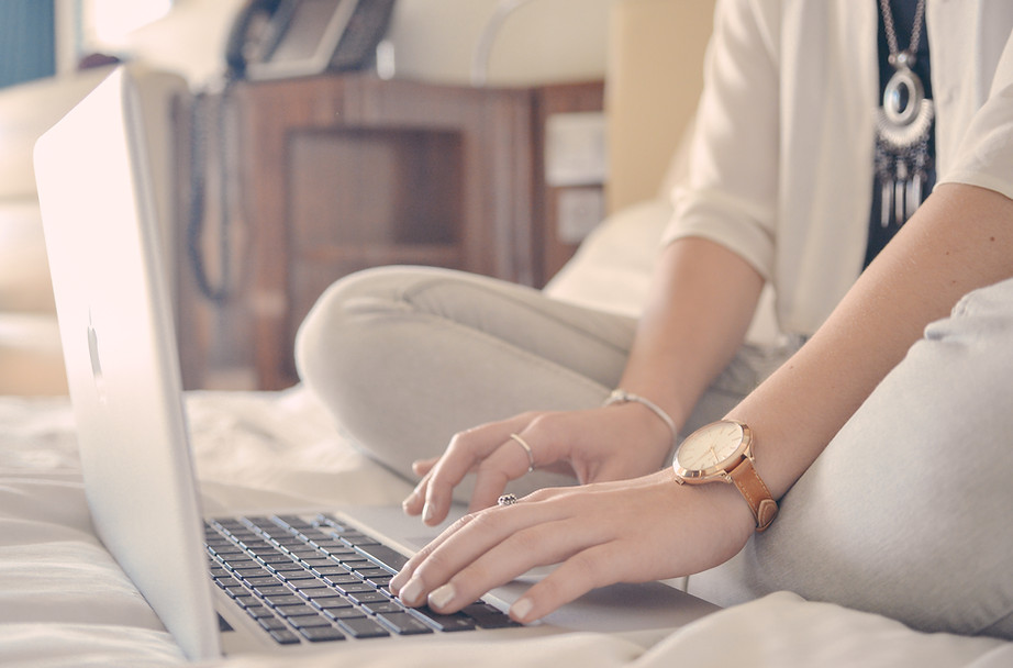 Laptop Typing on Bed