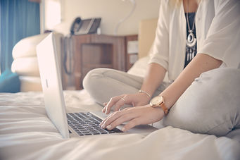 Laptop Typing on Bed