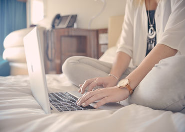 Laptop Typing on Bed