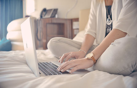 Laptop Typing on Bed