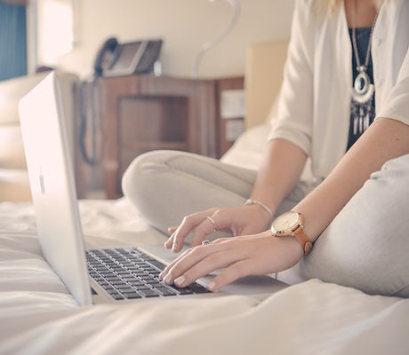 Laptop Typing on Bed