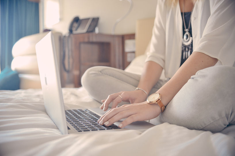 Laptop Typing on Bed