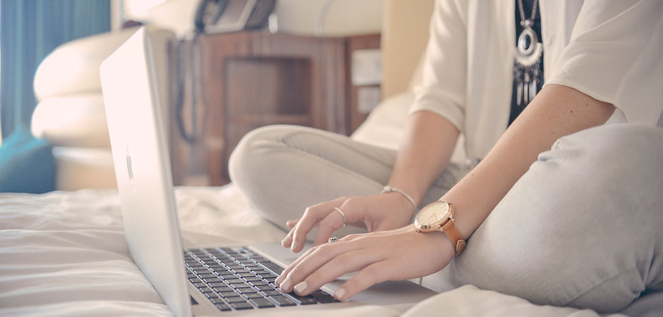 Laptop Typing on Bed
