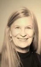 Mary Kane. She is a fair-skinned middle-aged woman. The photo is in black and white.