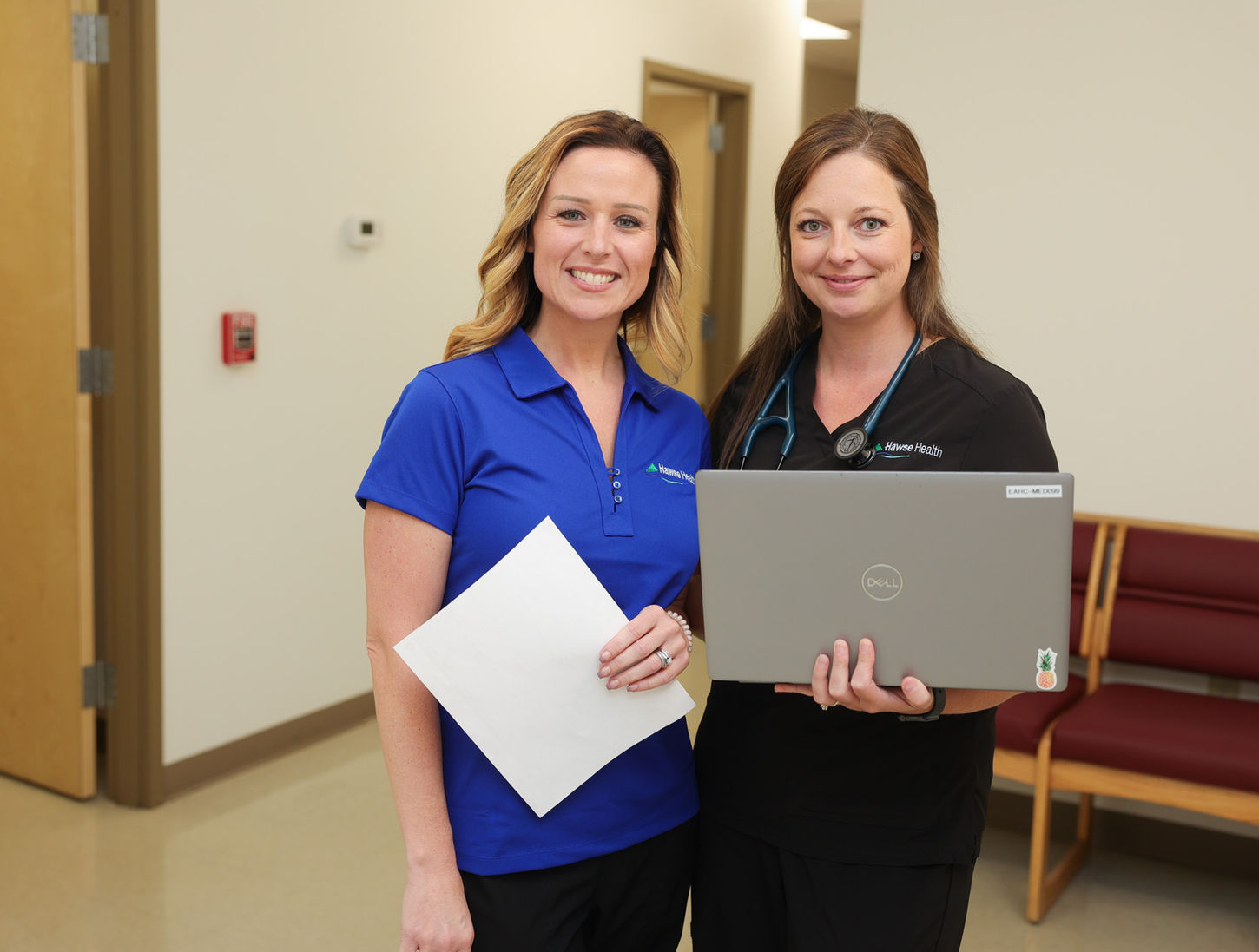 Provider and Medical Assistant posing for a photo.
