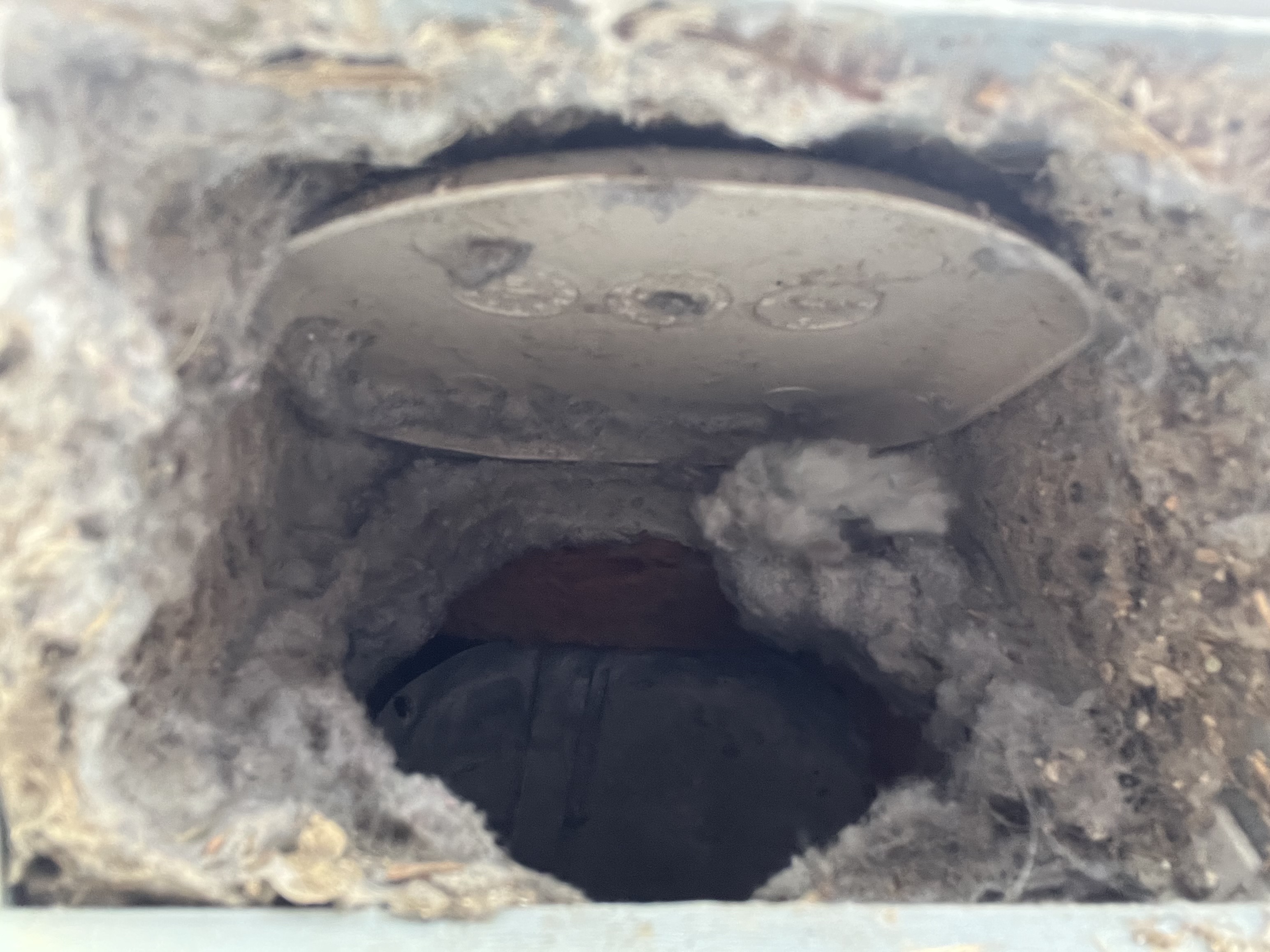 Before photo — air duct cleaning inside a 20-year-old Powell Ohio home showing significant debris accumulation