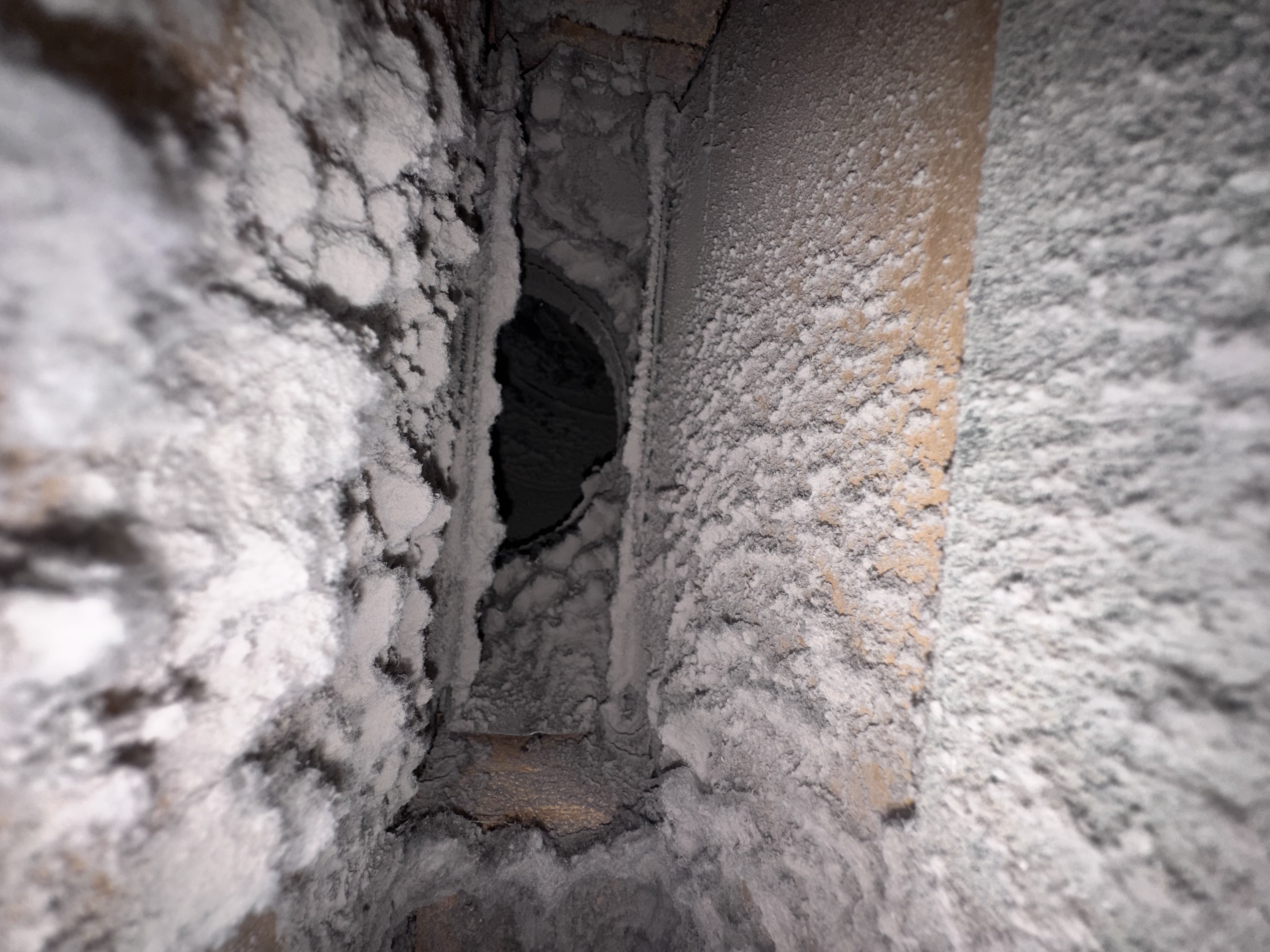 Before — severely clogged air duct in remodeled Powell Ohio home, years of debris and remodel dust