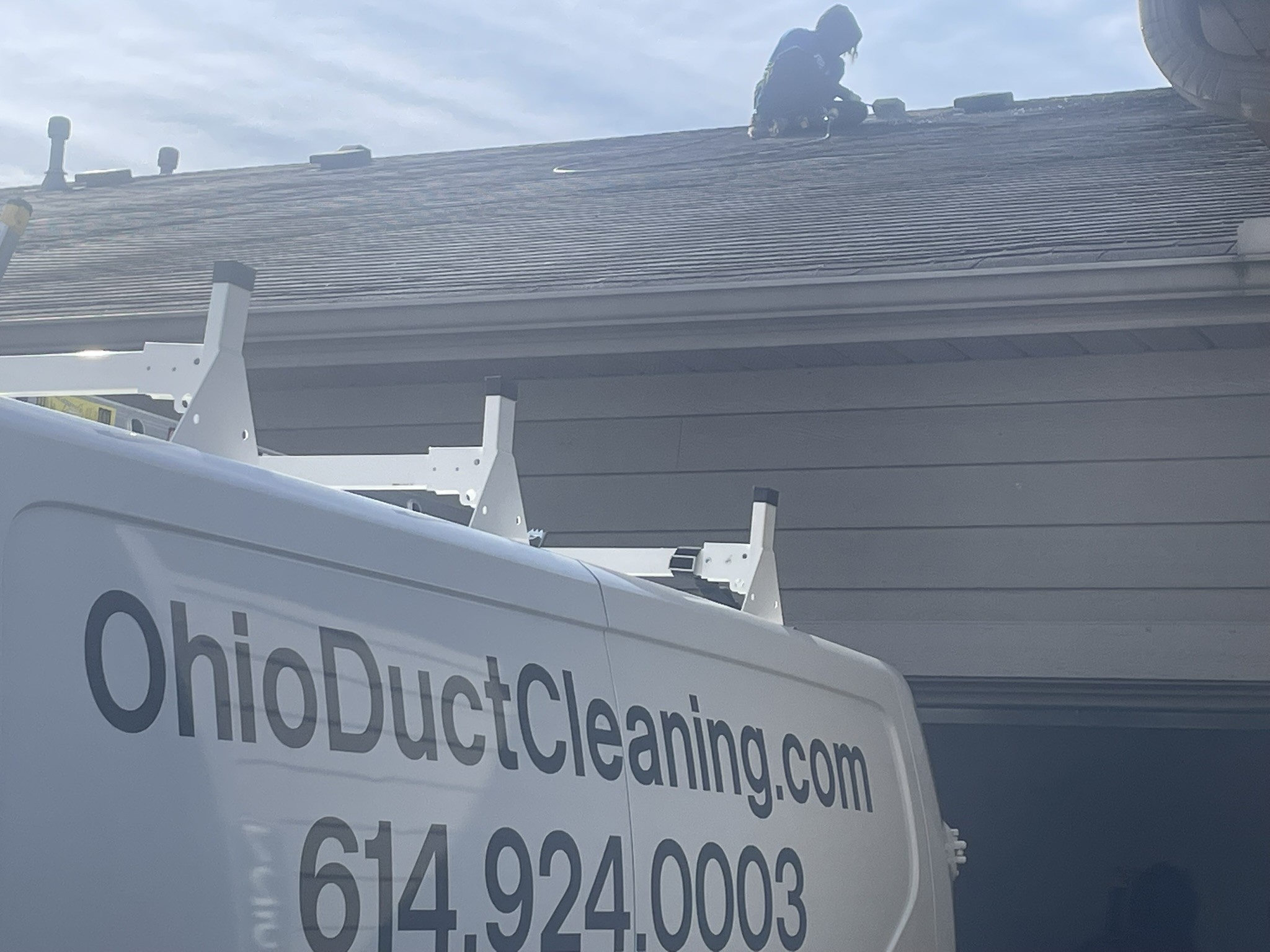 Clean Air Pros dryer vent cleaning on roof — Lewis Center Columbus Ohio
