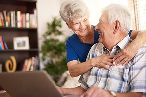 senior-marriage-using-laptop-living-room.jpg