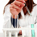 Scientist with Test Tubes