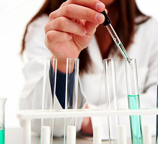 Scientist with Test Tubes