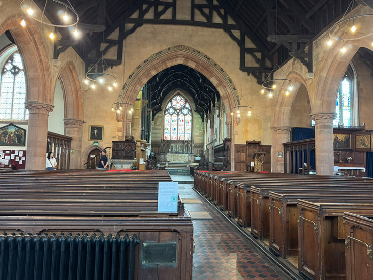 The view of a church from a bench
