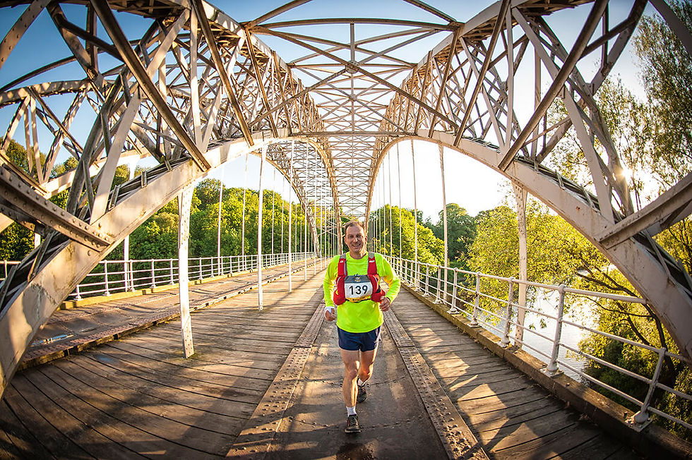 Man running on a bridge